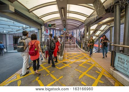 Hong Kong, China - December 4, 2016: the beginning of Mid-Levels escalator and walkway system on Queen's Road Central in Hong Kong, the longest outdoor covered escalator system in the world.