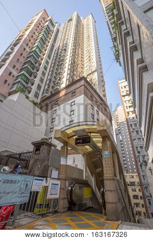 Hong Kong, China - December 4, 2016: The Central-Mid-Levels escalator exit-entrance to the system on Conduit Road, the world's longest escalator system.