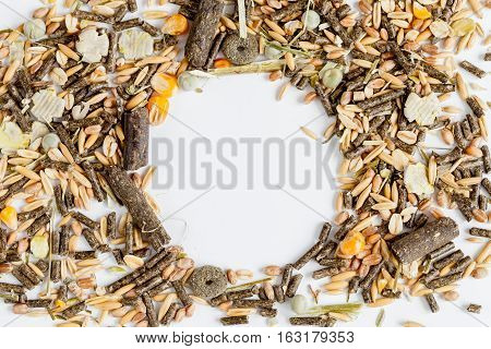 dry food for rodents on white background top view.