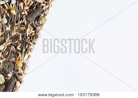 dry food for rodents on white background top view.
