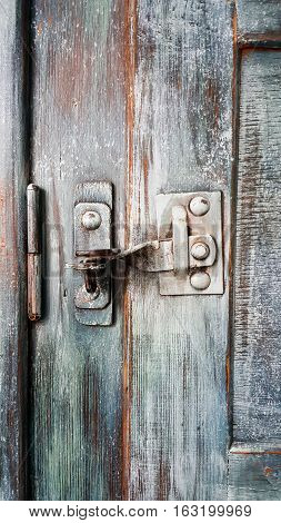 Old door lock and latch in vintage wardrobe