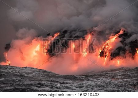 Molten lava flowing into Pacific Ocean from the Kilauea lava flow on Big Island of Hawaii