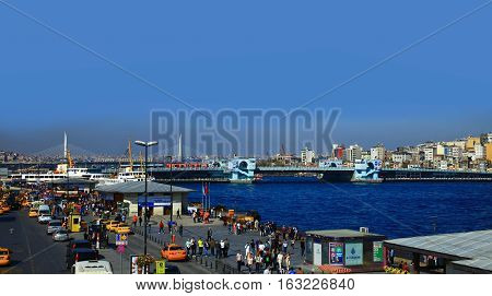 ISTANBUL TURKEY - 17 OCTOBER 2013: View of Eminonu and Galata Bridge in the Golden Horn Istanbul. Turkey.