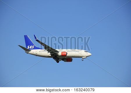 Amsterdam the Netherlands - May 6th 2016: SE-RJU SAS Scandinavian Airlines Boeing 737 approaching Schiphol Polderbaan runway arriving from Stockholm Sweden