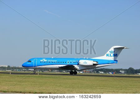 Amsterdam the Netherlands - August 18th 2016: PH-KZL KLM Cityhopper Fokker F70 taking off from Polderbaan Runway Amsterdam Airport Schiphol