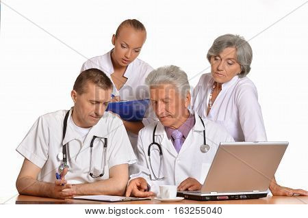 group of doctors on meting, discussing against white background