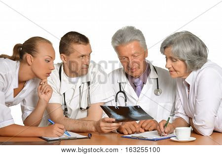 group of doctors on meting, discussing against white background