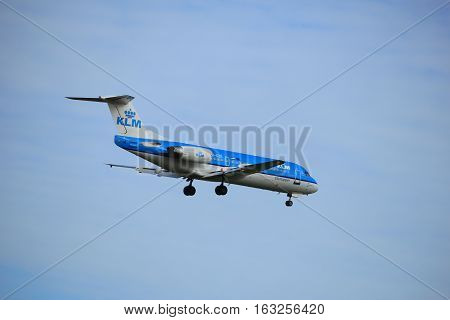 Amsterdam the Netherlands - July 15th 2016:PH-KZK KLM Cityhopper Fokker F70 approaching Polderbaan runway at Schiphol Amsterdam Airport arriving from Norwich United Kingdom