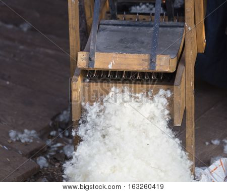 Old Wooden Carder And Raw Wool