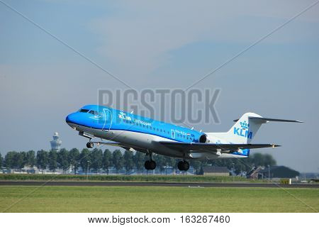 Amsterdam the Netherlands - August 18th 2016: PH-KZU KLM Cityhopper Fokker F70 taking off from Polderbaan Runway Amsterdam Airport Schiphol