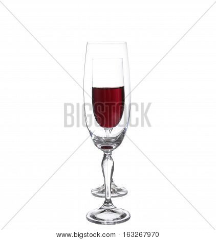Full And Empty Champagne Glasses With Red Wine