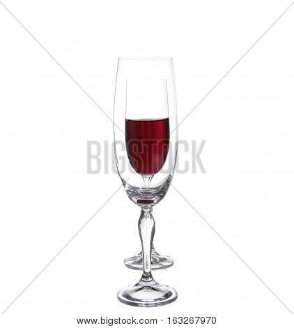 Full And Empty Champagne Glasses With Red Wine