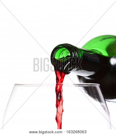 Red Wine Pouring On White Background, Closeup