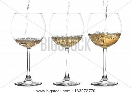 White Wine Pouring From The Bottle Intro The Glass On White Background