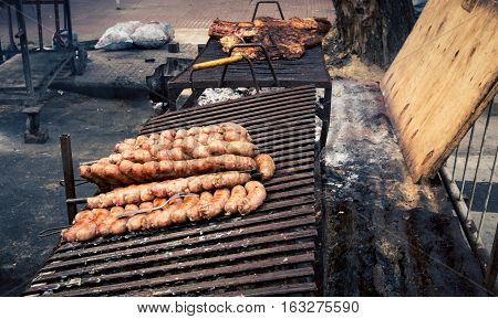 Sausages on the grill at the Feria de Mataderos,