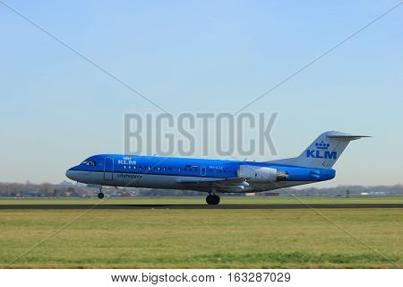 Amsterdam the Netherlands - November 25th 2016: PH-KZE KLM Cityhopper Fokker F70 taking off from Polderbaan Runway at Amsterdam Airport Schiphol