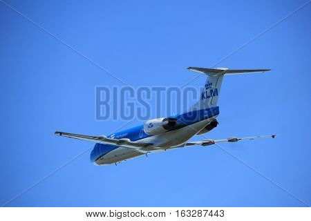 Amsterdam the Netherlands - November 25th 2016: PH-KZD KLM Cityhopper Fokker F70 taking off from Polderbaan Runway at Amsterdam Airport Schiphol