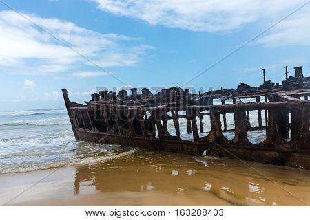 Fraser Island - February 29, 2016: The shipwrecked liner S.S. Maheno on the coast of Fraser Island in Queensland, Australia