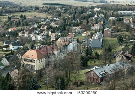 Tisa Ustecky kraj Czech republic - december 10 2016: village Tisa with elementary school building in winter tourist season without snow