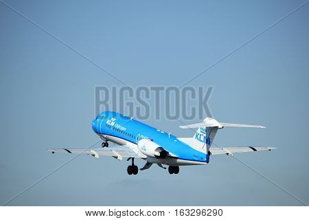 Amsterdam the Netherlands - August 18th 2016: PH-KZS KLM Cityhopper Fokker F70 taking off from Polderbaan Runway Amsterdam Airport Schiphol
