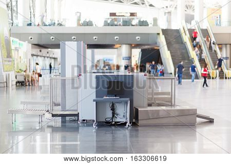 Airport security check point with metal detector and X ray scaner