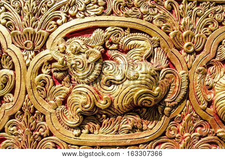 Close Up Beautiful StuccoThai Traditional Art Fantastic Beast or Animal(Lai Thai) Handmade Background Wallpaper Texture
