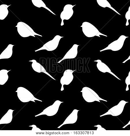 Seamless pattern background with birds silouettes. white on black