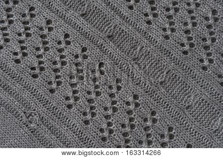 patterned knitted voluminous textile background or texture