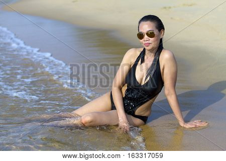 Lady body pretty swimsuit in Ban Krut Beach at Prachuap Khirikhun Province Thailand
