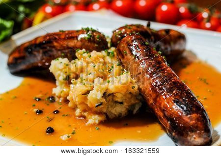 Cumberland sausage and mash served with fine gravy