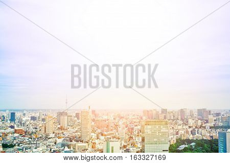 Asia Business concept for real estate and corporate construction - panoramic modern cityscape building bird eye aerial view of skytree under sunrise and morning blue bright sky in Tokyo Japan