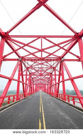 Symmetrical red steel structure construction of bridge and road in Xiluo Taiwan