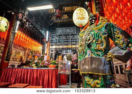 Xiluo, Taiwan - Mar. 12 : God statue in traditional old oriental chinese temple in Taiwan (Chinese Translation on lantern : name of the chinese god of sea mazu(matsu)) at Mar. 12, 2016