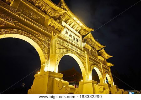 Asia culture - night view of Liberty Square (Archway of Chiang Kai Shek Memorial Hall) in Taipei Taiwan. the Chinese text on the archway : Liberty Square