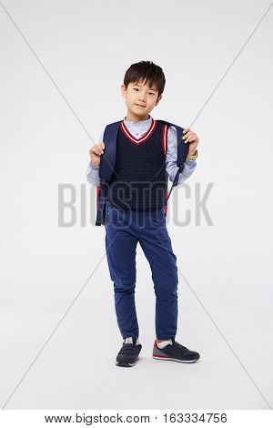Portrait of Lorean elementary pupil, isolated on white