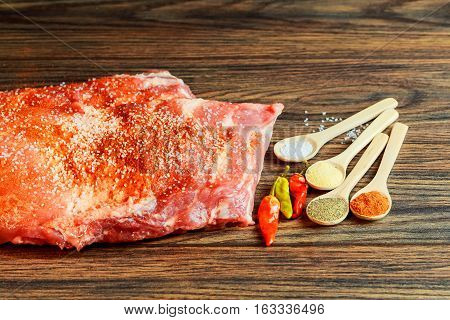 Baby Back Rib Presented With Common Spices Used For Rub Seasoning