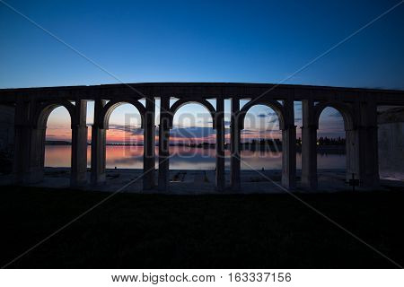 Sunset over the city lake in Bucharest. Port on Morii Lake Island