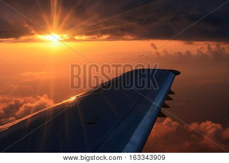 An overwing view of a nice sunset and beautiful skies