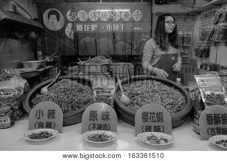 People Selling Foods On Street At Night