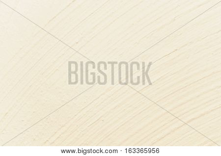 Light yellow plastering background with curving structure