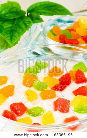 View Close-up On Oatmeal With Colorful Candied Fruits