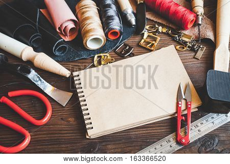 cobbler tools in workshop on wooden background mock up.