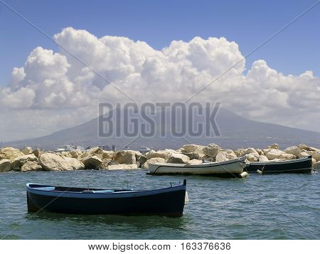 Napoli, Italy. In the background, the Vesuvio covered with clouds.
