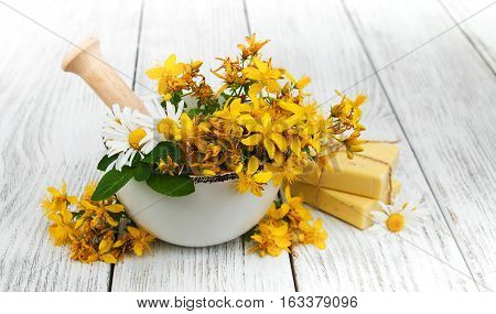 Tutsan Flowers  And Mortar With Soap