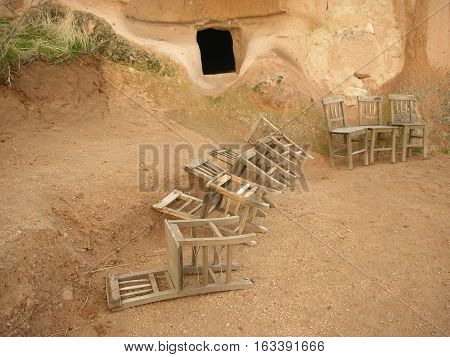Chairs in front of a cave in Capadocia, Turkey.