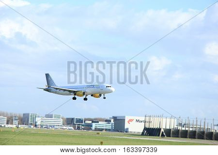 Amsterdam The Netherlands march 31 2015: EC-HQI Vueling Airbus A320-214 approaching on runway 09-27 Buitenveldert