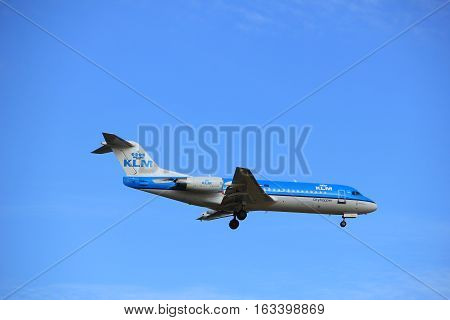 Amsterdam the Netherlands - July 15th 2016:PH-KZK KLM Cityhopper Fokker F70 approaching Polderbaan runway at Schiphol Amsterdam Airport arriving from Norwich United Kingdom