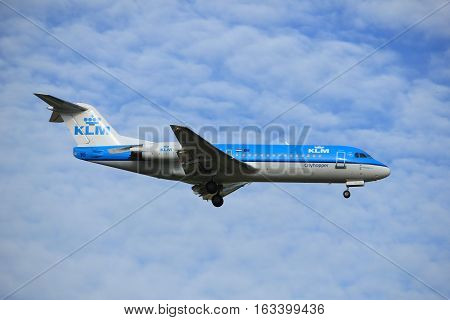 Amsterdam the Netherlands - July 15th 2016: PH-KZC KLM Cityhopper Fokker F70 approaching Polderbaan runway at Schiphol Amsterdam Airport arriving from Frankfurt Germany