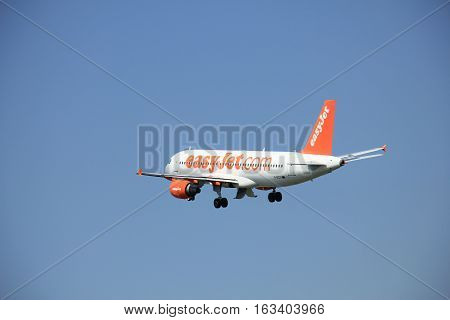 Amsterdam The Netherlands - June 12 2015: G-EZTI easyJet Airbus A320-214 takes off at Amsterdam Airport Schiphol Polderbaan runway. EasyJet is a British low-cost airline carrier based at London Luton Airport