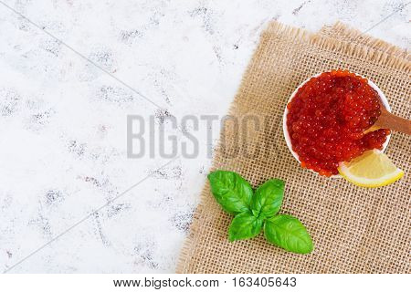 Red Caviar On White Background. Top View. Flat Lay